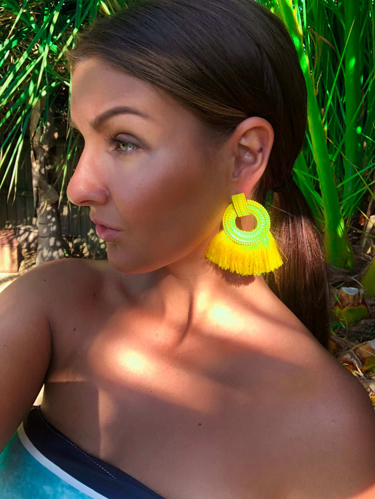 “SUNS OUT” TASSEL EARRINGS